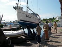 <i>Stormcat</i> being put back in the water